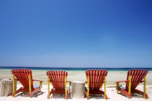 Four chairs on the beach in Mexico Bring friends to the beaches of Mexico